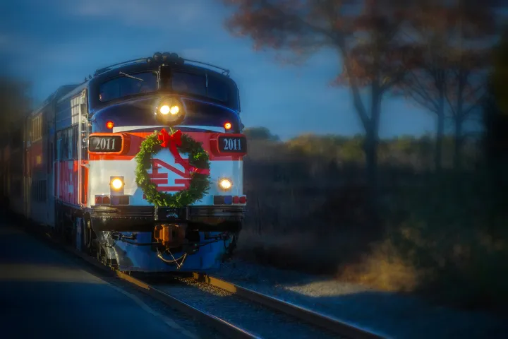a large long train on a steel track