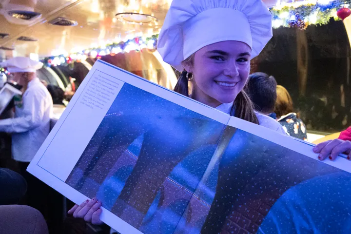 a person holding a colorful umbrella