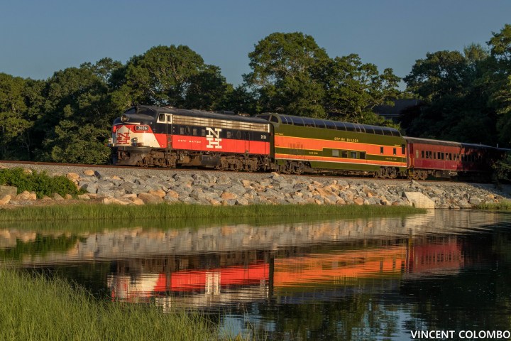 a large long train on a steel track