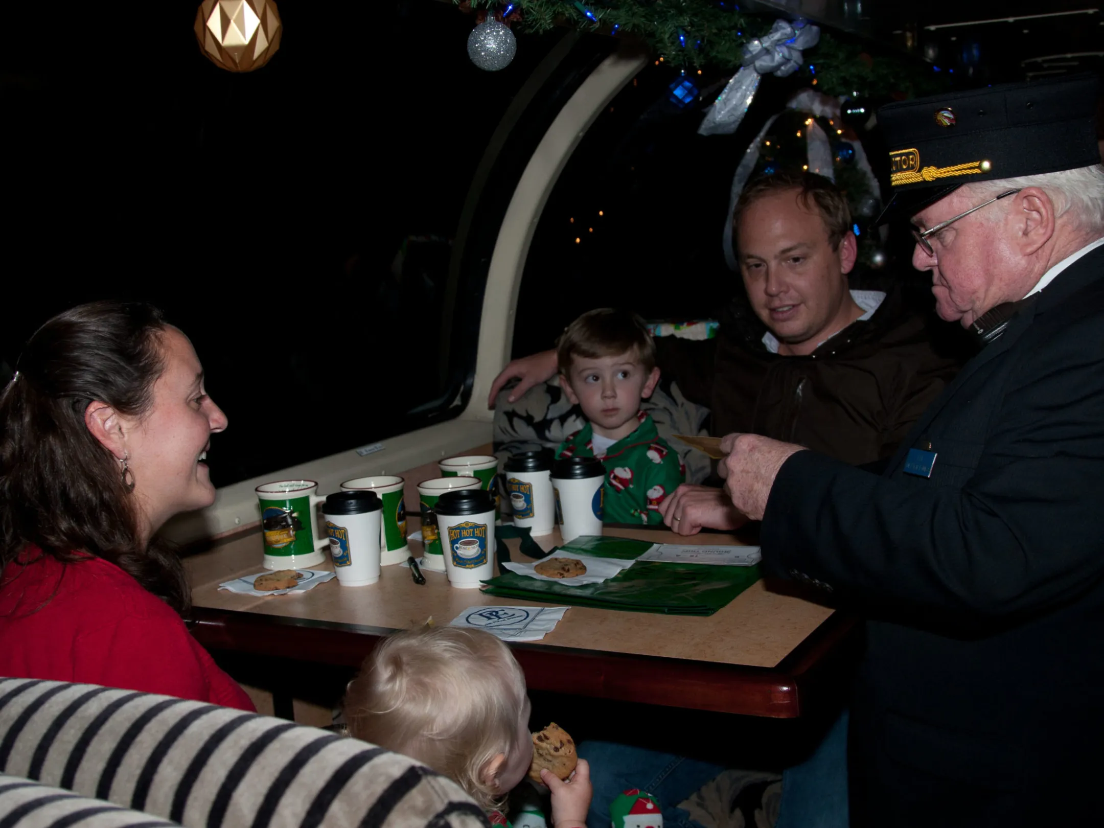 a group of people sitting at a table