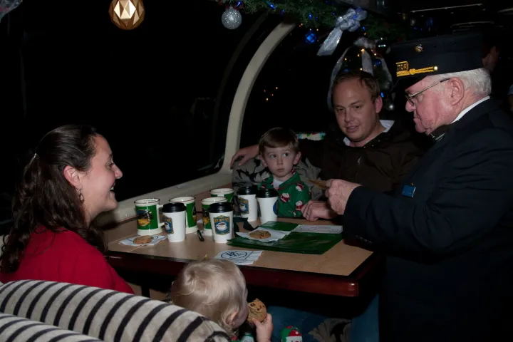a group of people sitting at a table