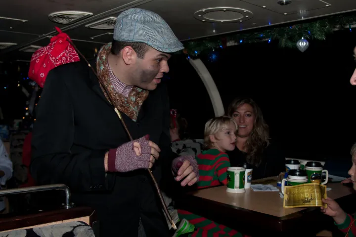 a man and a woman holding a birthday cake