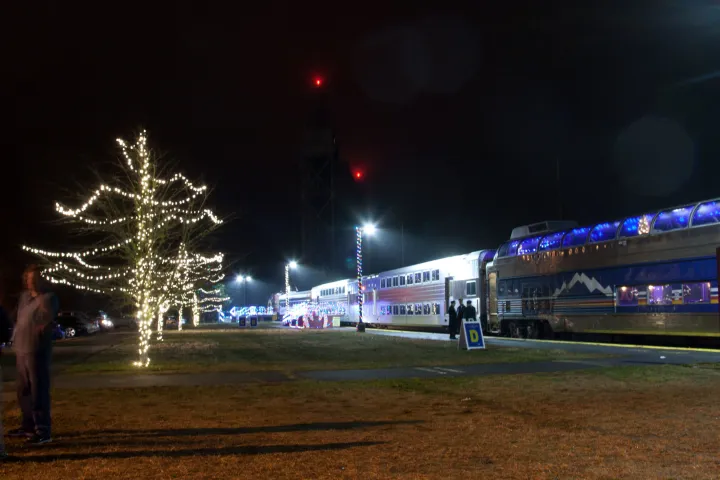 a train on the tracks at night