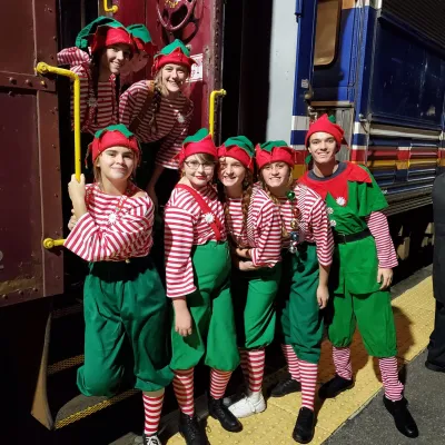 a group of people posing for the camera