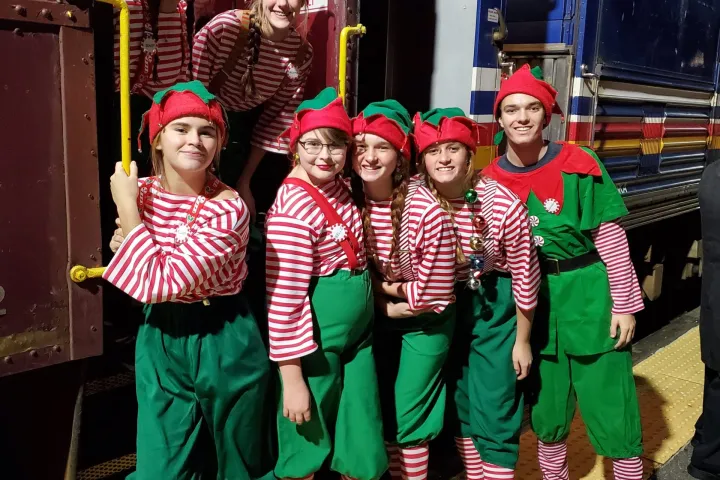 a group of people posing for the camera