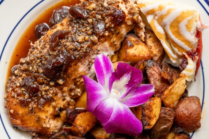 a plate of food with meat and vegetables