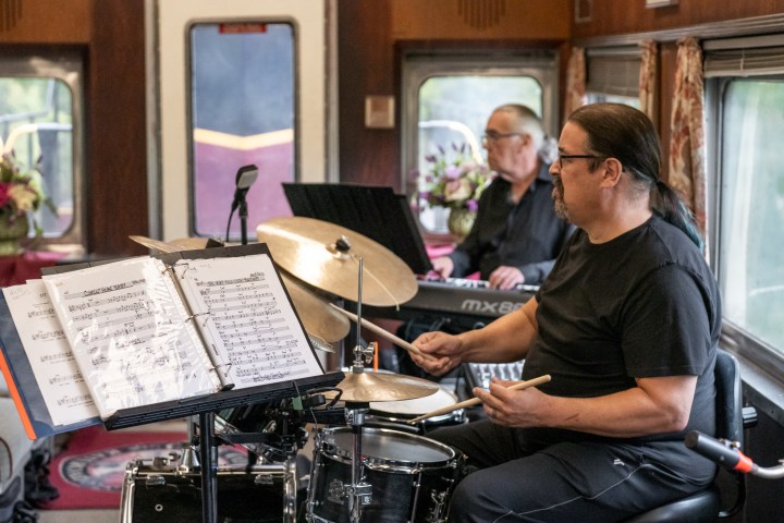a man sitting on a motorcycle