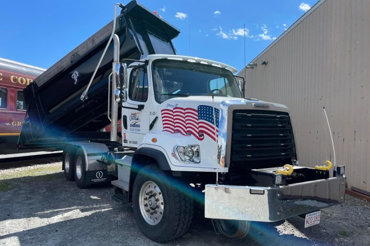 a truck is parked on the side of a building