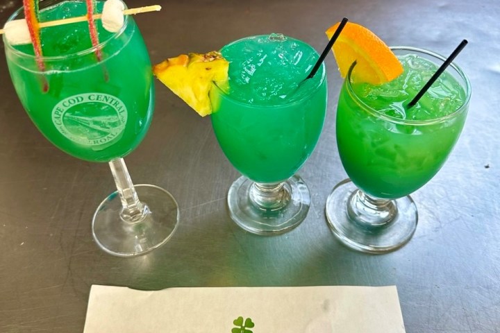 a stack of flyers on a table